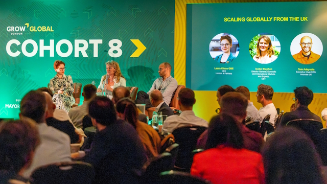 A panel of three speaking to a crowd of people with green background with the words Grow London Global Cohort 8 written on it, alongside profile pictures and job descriptions of the three panellists.