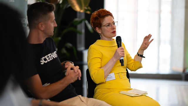 Two speakers at a business event.