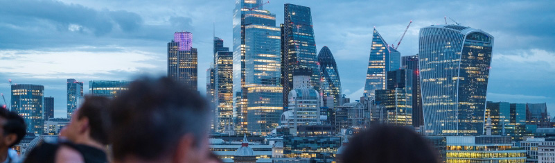 corporate event takes place with London city skyline in background