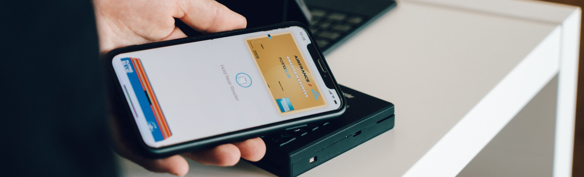 Person showing a boarding pass on their black Android phone.