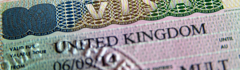 A close up of a passport page with the words "visa United Kingdom" printed.