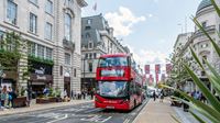 A red double decker London bus on Regent Street.