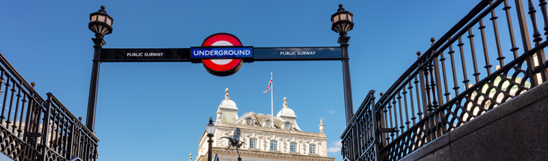 A London Tube station exit onto Piccadilly Circus.