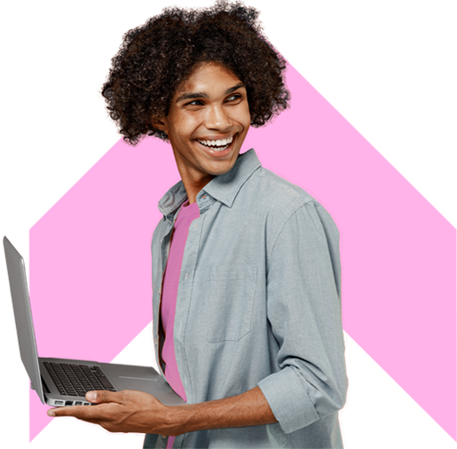 A smiling man holding a laptop with a pink chevron in the background.